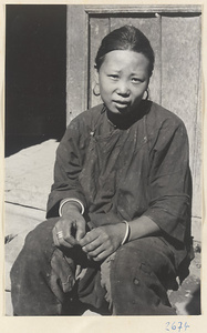 Woman wearing earrings, bracelets, and rings in the Lost Tribe country