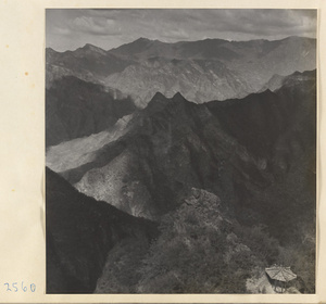 View of the mountains from Sheng mi zhi tang Monastery with a small pavilion in the foreground