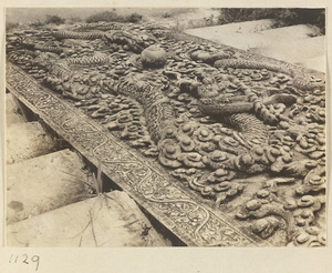 Carved marble slab with dragon motif on stairs at Da Fo si
