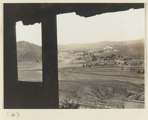 View from a window of Pu du dian at Yi li miao showing a general view of temple complexes at Xu mi fu shou miao and Pu tuo zong cheng miao