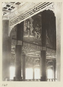 Interior view of Pu du dian at Yi li miao showing murals and columns