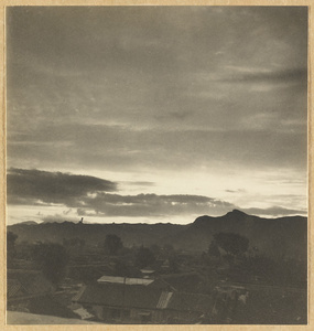 Silhouette of the rooftops of Chengde at dawn