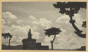 Silhouette of a Bai tai with a stupa-type pagoda on the roof at Pu tuo zong cheng miao