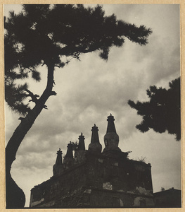 Silhouette of Wu ta bai tai showing five stupa-type pagodas on the roof at Pu tuo zong cheng miao