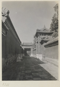 Alley with two small gates in the Forbidden City