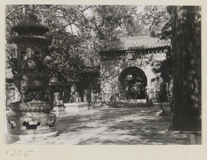 South facade of Tian yi men, incense burner, and pair of gilt bronze qi lin