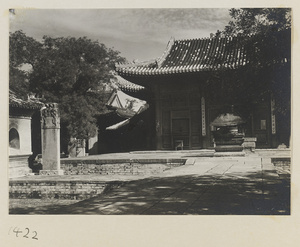 Facade detail of a temple building with door couplets, courtyard with marble stelae, and facade detail of a Bei ting at Dong yue miao