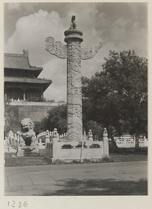 Marble lion, hua biao, and detail of south facade of Tian an men