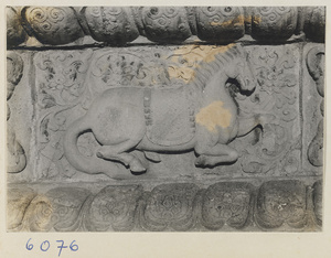 Detail of stone relief work at Wu ta si showing panel with galloping horse