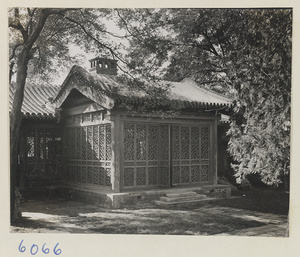 Building detail showing enclosed porch with cracked-ice latticework at Ta Yuan Fu, Yenching