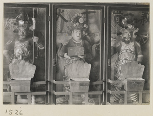 Interior of Lao ye miao showing three shrine figures in glass cases