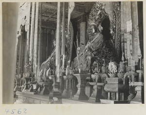 Interior of temple building at Yong he gong showing altars with Bodhisattvas