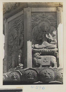Detail of Hua zang hai ta at Yuquan Hill showing marble relief carving with warrior and Buddha figures