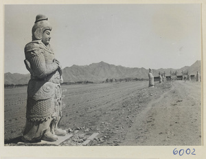 Stone warrior with folded hands on the Shen Dao leading to the Ming Tombs