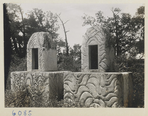 Two stone altars with relief carvings of mountains and waves at Xian nong tan