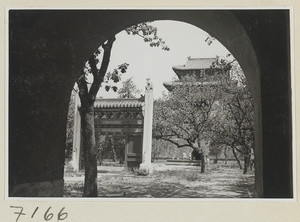 Protective screen in third courtyard of Chang ling and south facade of Fang cheng surmounted by Ming lou seen from inside Ling qin men