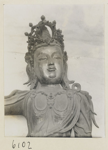 Detail of the alleged Sandalwood Buddha showing head and shoulders