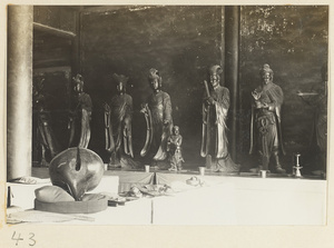 Temple interior at Xi yu si showing muyu and statues