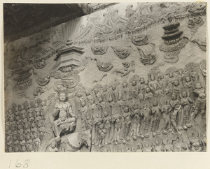 Interior of Tian ning si ta showing relief panel with a Bodhisattva seated on an elephant, temples, mountains, Luohans, and Bodhisattvas