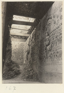 Interior of storied wooden pagoda at Tian ning si showing walls with relief work