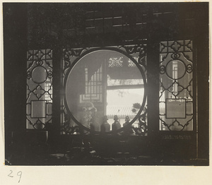 Temple interior at Xi yu si showing a partition with latticework