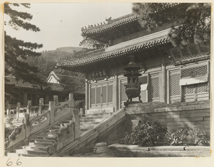 Detail of temple at Tan zhe si showing facade, terrace, and incense burner