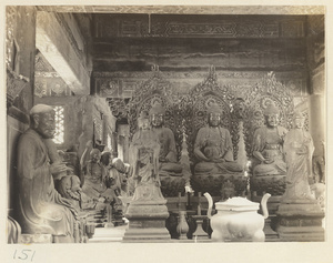 Interior of Luohan tang at Bi yun si showing an altar with Buddha figures and Luohans