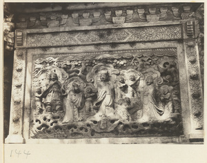 Detail of Jin gang ta at Bi yun si showing relief panel with Buddhist scene