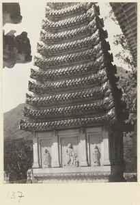 Detail of Jin gang ta at Bi yun si showing relief carvings and lower eaves