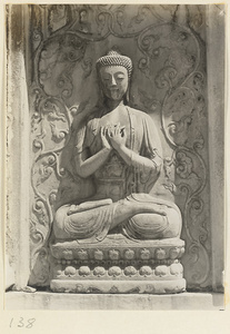 Detail of Jin gang ta at Bi yun si showing relief carving of Buddha