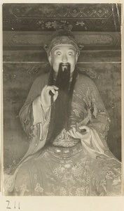 Bearded shrine figure holding a ru yi sceptre at the Old Wu Garden