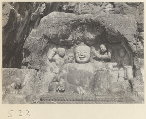 Buddha reliefs cut into the hillside at Yuquan Hill