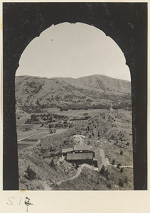 View of temple buildings and landscape from atop Yuquan Hill