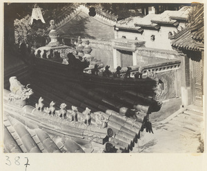 Building details showing roof ornaments and ornamental windows at Wan shou si