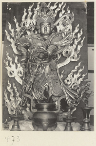 Temple interior showing altar with a statue of a Bodhisattva with his hand on a sceptre at Fa yuan si