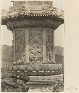 Detail of Hua zang hai ta showing carved relief panels with Buddhist scenes on Yuquan Hill