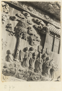 Detail of a pagoda showing a relief carving with a Buddhist scene at Huang si