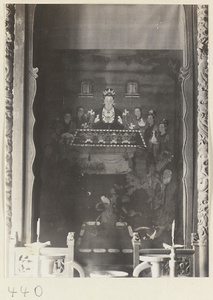 Temple interior showing niche with a painting at Bai yun guan