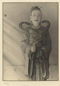 Interior of Wan shan dian showing shrine figure