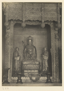 Interior of Wan shan dian showing left section of main altar with statues of Bodhisattva and attendants