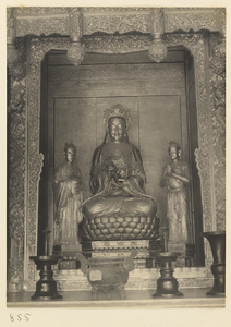 Interior of Wan shan dian showing right section of main altar with statues of Bodhisattva and attendants