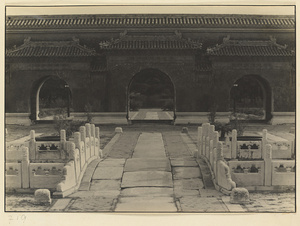 Stone bridge and north facade of outer gate leading to ancestral halls at Tai Miao