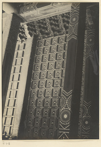 Interior detail of a hall at Tai miao showing a coffered ceiling and painted roof beams