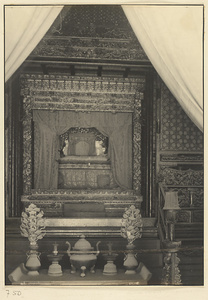 Interior detail of a hall at Tai miao showing throne and altar with ritual objects