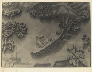 Detail of screen wall with relief work at Nanhai Gong Yuan showing landscape with a man on a boat
