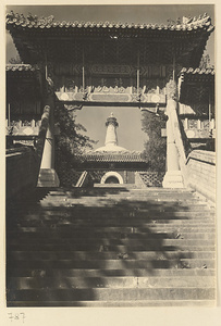 South facade of Bai ta seen through archway of Long guang pai lou