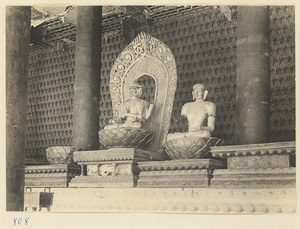 Interior of temple building at Beihai Gong Yuan showing altar with Buddha figures