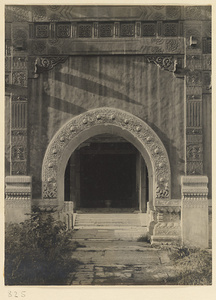 Detail of pai lou at Guanyin dian showing glazed-tile and marble relief work on central arch