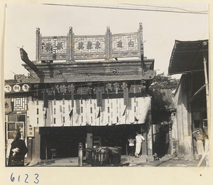 Facade of a shop that sells pastry showing shop signs