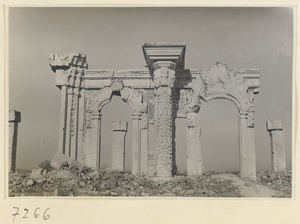 Arches and carved marble column from a ruined building at Yuan Ming Yuan